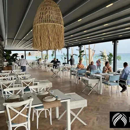 Апартаменты Luxurious Beachfront Townhouse Boghaz